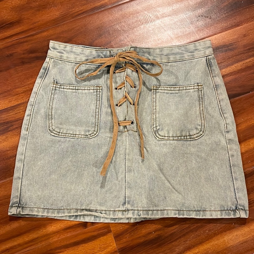 Lace up light denim mini skirt